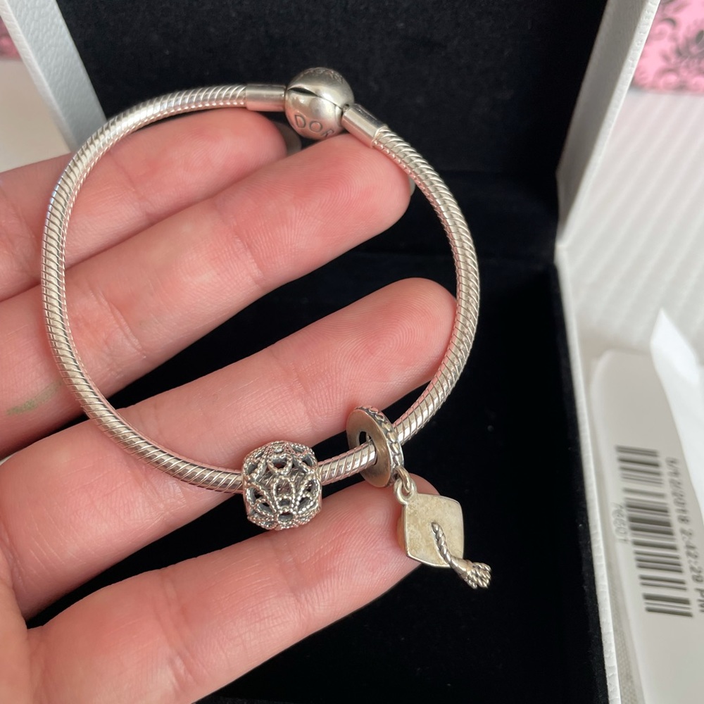 Pandora bracelet with graduation & roses charms